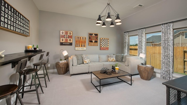 20315 Desert Foal Dr, Tomball, TX 77377 - living room featuring light colored carpet, a chandelier, baseboards, and lofted ceiling