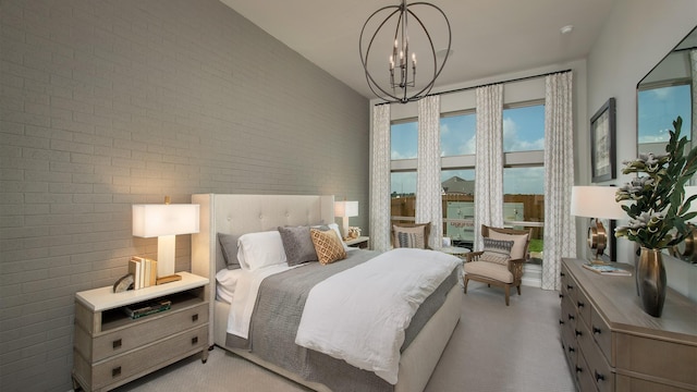 20315 Desert Foal Dr, Tomball, TX 77377 - carpeted bedroom with a chandelier and brick wall
