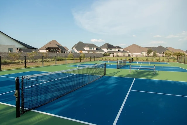 20315 Desert Foal Dr, Tomball, TX 77377 - view of tennis court featuring a residential view and fence