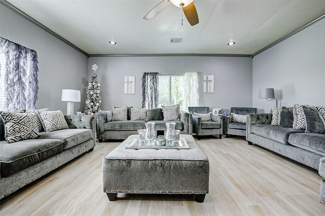 873 W Santa Fe St, Conroe, TX 77301 - living room featuring light wood finished floors, crown molding, ceiling fan, and recessed lighting