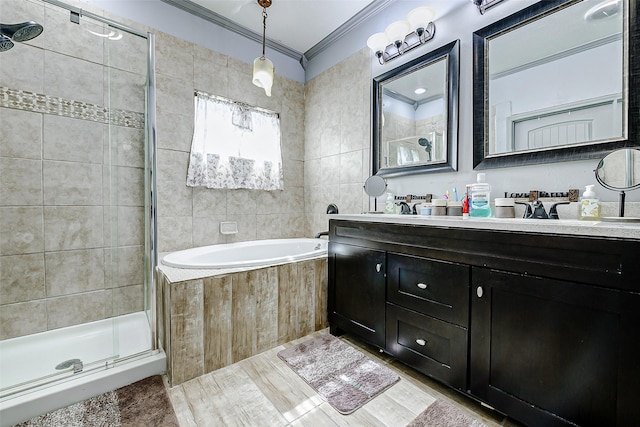 873 W Santa Fe St, Conroe, TX 77301 - bathroom featuring ornamental molding, a shower stall, a garden tub, and double vanity