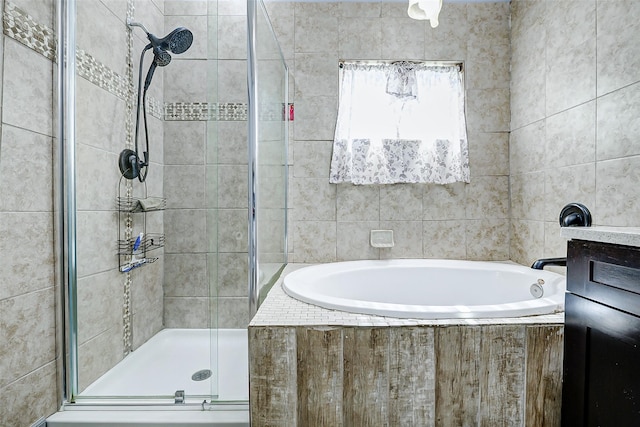 873 W Santa Fe St, Conroe, TX 77301 - bathroom featuring a stall shower and a bath