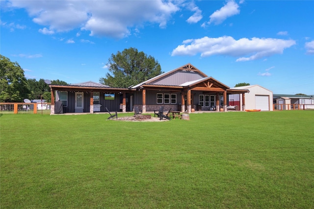 154 Lcr 893, Jewett, TX 75846 - rear view of property with board and batten siding and a garage