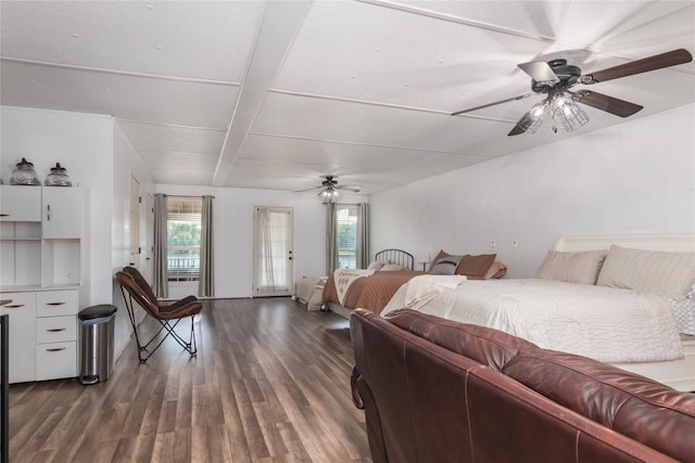 154 Lcr 893, Jewett, TX 75846 - bedroom featuring multiple windows, dark wood-type flooring, beamed ceiling, and access to outside