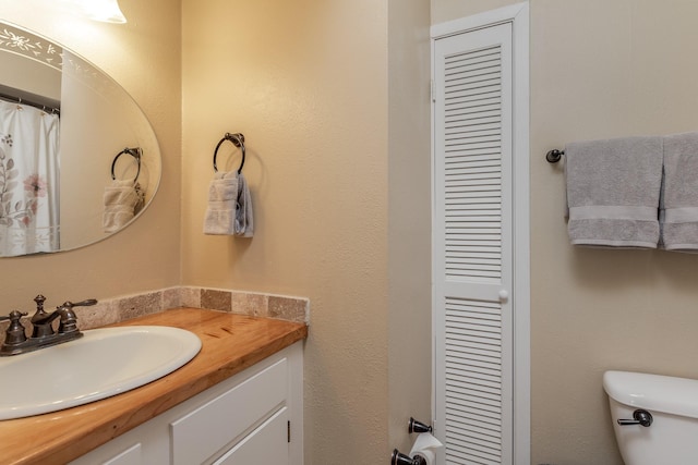 2228 S Piney Point Rd Unit 109, Houston, TX 77063 - bathroom with a closet, vanity, and toilet