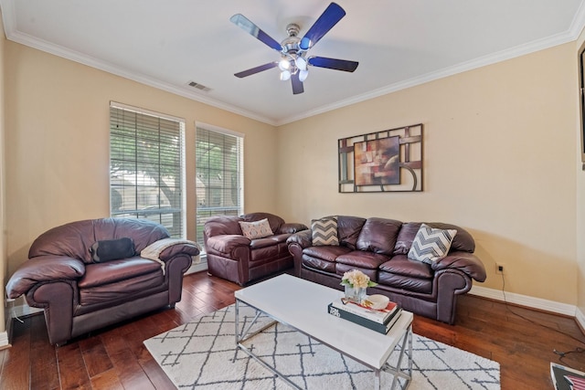 8910 Cote Ct, Houston, TX 77064 - living room featuring a ceiling fan, wood-type flooring, ornamental molding, and baseboards