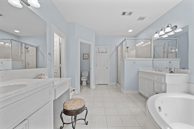 8910 Cote Ct, Houston, TX 77064 - bathroom with a stall shower, tile patterned flooring, toilet, and two vanities