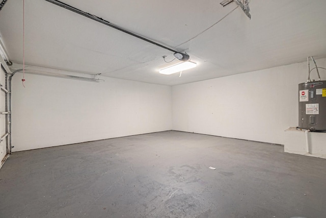 10056 Woodhollow Dr, Conroe, TX 77385 - garage with water heater and a garage door opener