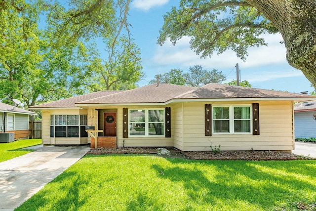 513 Gardenia St, Lake Jackson, TX 77566 - ranch-style home featuring central air condition unit, driveway, and a shingled roof
