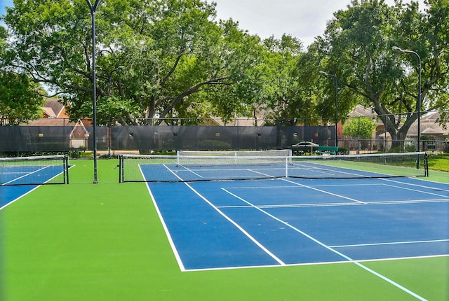 1023 Goldfinch Ave, Sugar Land, TX 77478 - view of tennis court with fence and community basketball court