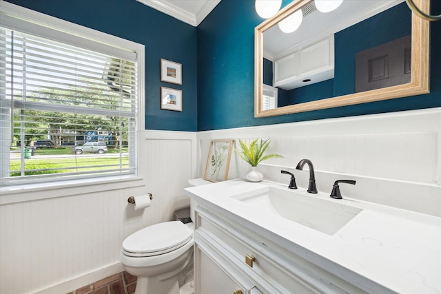 303 W 33rd St, Houston, TX 77018 - bathroom featuring a wainscoted wall, toilet, crown molding, and vanity