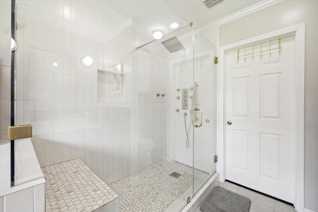 303 W 33rd St, Houston, TX 77018 - bathroom with a shower stall, ornamental molding, and tile patterned floors