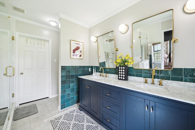 303 W 33rd St, Houston, TX 77018 - bathroom with a shower stall, tile walls, double vanity, crown molding, and tile patterned flooring