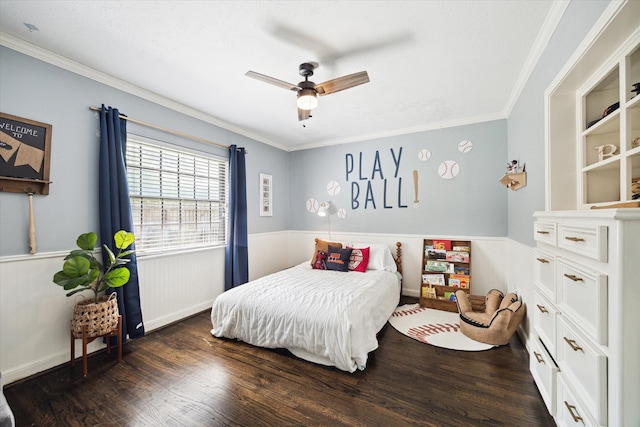 303 W 33rd St, Houston, TX 77018 - bedroom with ornamental molding, dark wood-type flooring, wainscoting, and ceiling fan