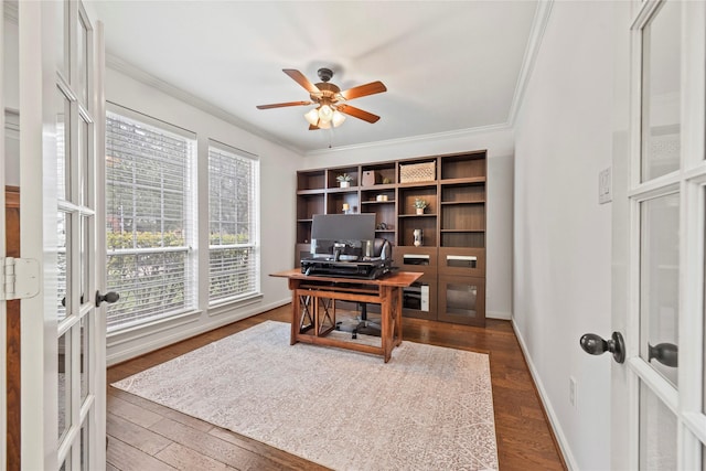 9210 Cold Hollow Ln, Missouri City, TX 77459 - home office with ornamental molding, a ceiling fan, dark wood-style flooring, french doors, and baseboards
