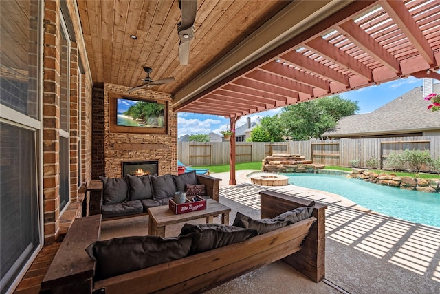 9210 Cold Hollow Ln, Missouri City, TX 77459 - view of patio / terrace with a fenced backyard, an outdoor living space with a fireplace, and a pergola