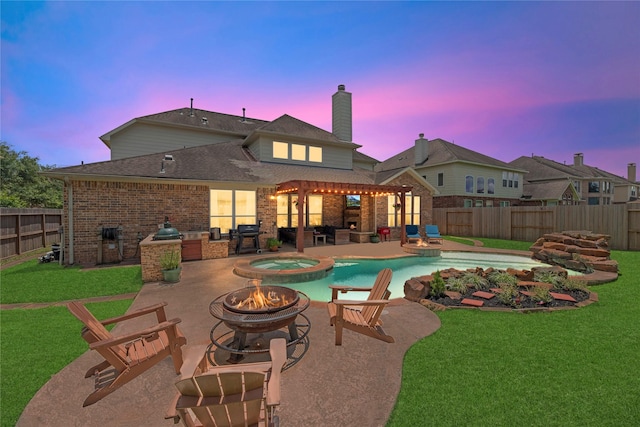 9210 Cold Hollow Ln, Missouri City, TX 77459 - view of pool with a fire pit, a patio area, and a pool with connected hot tub