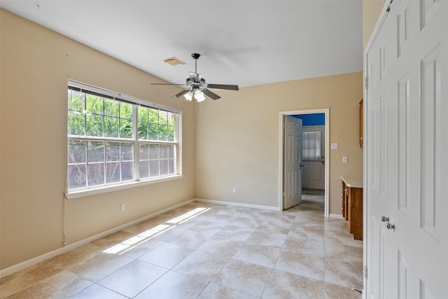 21735 Cayman Point Dr, Katy, TX 77450 - unfurnished room featuring a ceiling fan, baseboards, and light tile patterned flooring