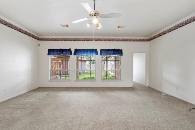 21735 Cayman Point Dr, Katy, TX 77450 - spare room with crown molding, ceiling fan, carpet, and baseboards