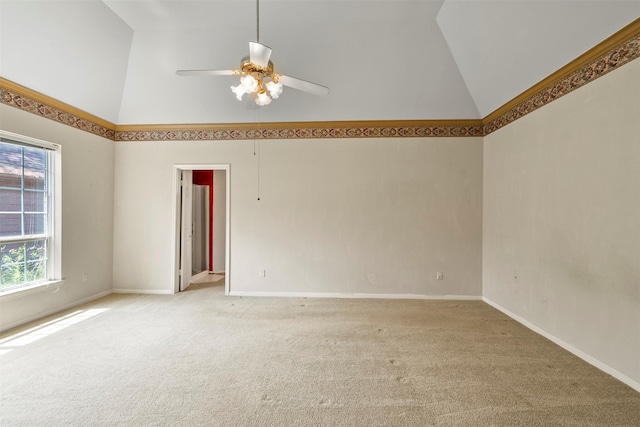 21735 Cayman Point Dr, Katy, TX 77450 - empty room featuring a ceiling fan, light colored carpet, high vaulted ceiling, and baseboards