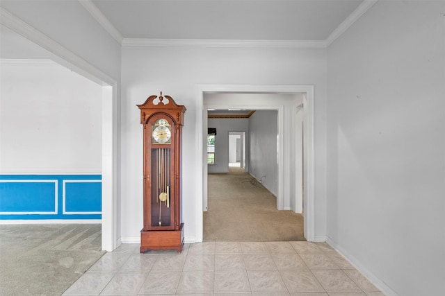 21735 Cayman Point Dr, Katy, TX 77450 - corridor featuring light carpet, ornamental molding, baseboards, and light tile patterned flooring
