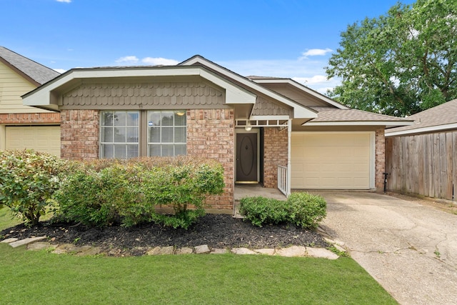9219 Goodmeadow Dr, Houston, TX 77064 - single story home with an attached garage, brick siding, and concrete driveway