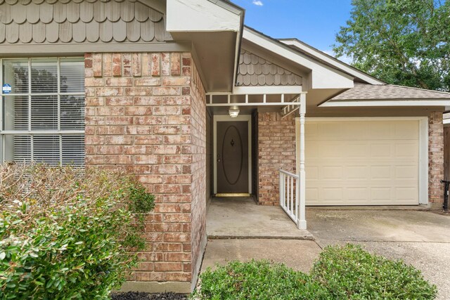 9219 Goodmeadow Dr, Houston, TX 77064 - entrance to property with brick siding, driveway, and a garage