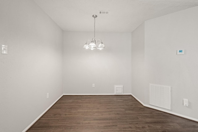 9219 Goodmeadow Dr, Houston, TX 77064 - unfurnished room with wood finished floors, a chandelier, and baseboards