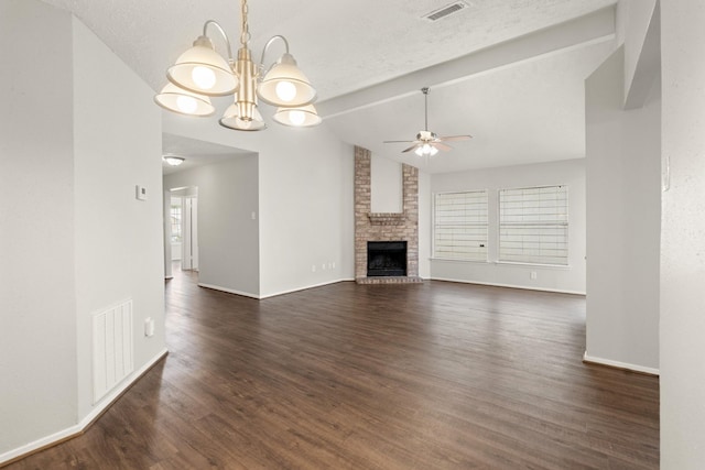 9219 Goodmeadow Dr, Houston, TX 77064 - unfurnished living room with a ceiling fan, a chandelier, dark wood-style flooring, and a fireplace