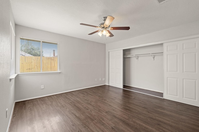 9219 Goodmeadow Dr, Houston, TX 77064 - unfurnished bedroom featuring wood finished floors, a closet, baseboards, and ceiling fan
