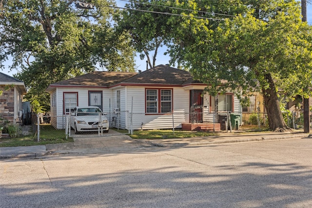 5410 Margarita St, Houston, TX 77020 - view of front of house featuring a gate, fence, and driveway