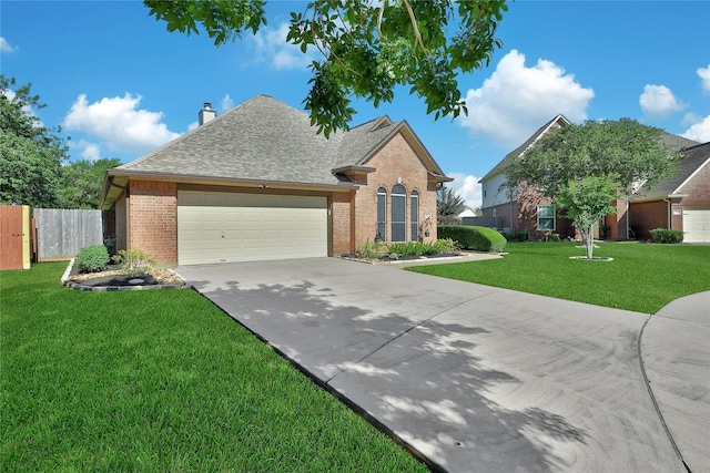 61 Chicory Ct, Lake Jackson, TX 77566 - traditional home featuring brick siding, an attached garage, concrete driveway, roof with shingles, and a chimney