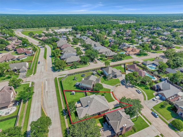 61 Chicory Ct, Lake Jackson, TX 77566 - aerial perspective of suburban area featuring property boundaries highlighted and a forest