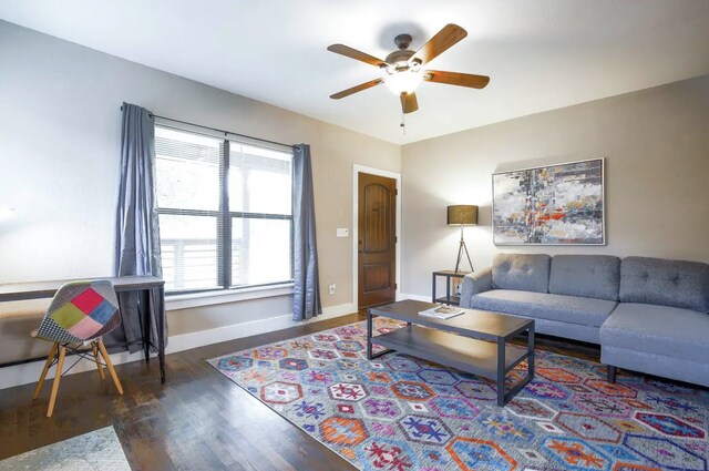 4434 Leeland St, Houston, TX 77023 - living room with ceiling fan, wood finished floors, and baseboards