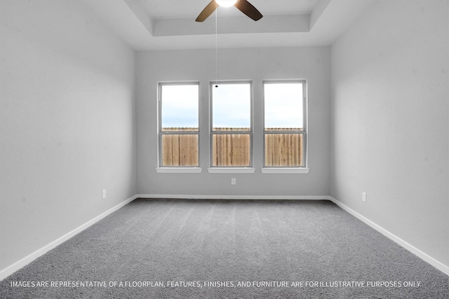 2908 Apple Rose Ln, Katy, TX 77493 - unfurnished room with ceiling fan, carpet, a tray ceiling, and baseboards
