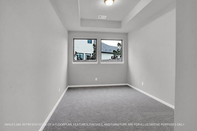 2908 Apple Rose Ln, Katy, TX 77493 - carpeted empty room featuring a raised ceiling and baseboards