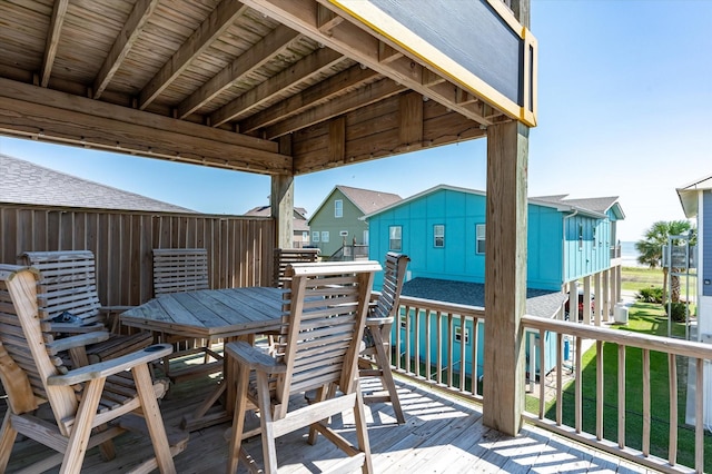 2932 Lakeside Dr, Crystal Beach, TX 77650 - deck featuring outdoor dining space and a residential view