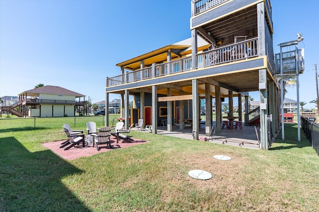 2932 Lakeside Dr, Crystal Beach, TX 77650 - back of property featuring a patio and a deck