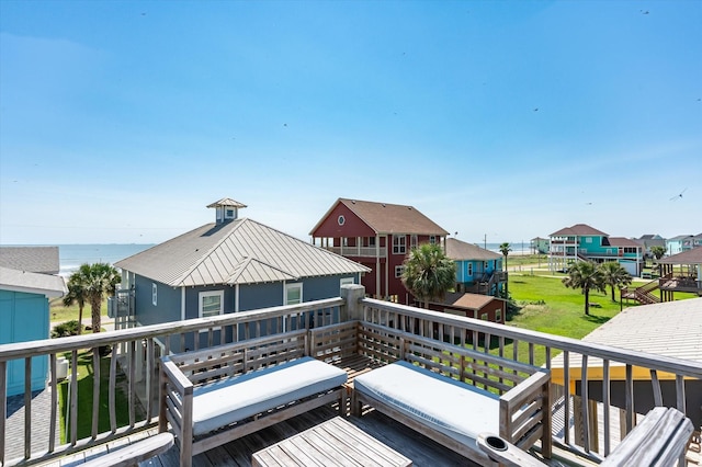 2932 Lakeside Dr, Crystal Beach, TX 77650 - wooden terrace featuring a residential view