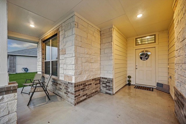310 Morning Dove Trl, Sealy, TX 77474 - view of exterior entry featuring a porch