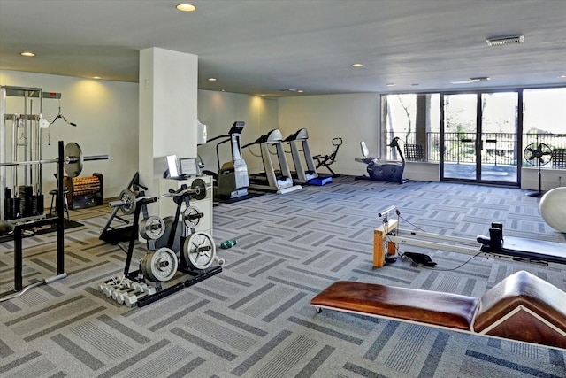 gym featuring carpet floors and recessed lighting