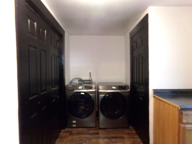 413 Paulus St, Schulenburg, TX 78956 - washroom featuring washing machine and dryer and dark wood-type flooring
