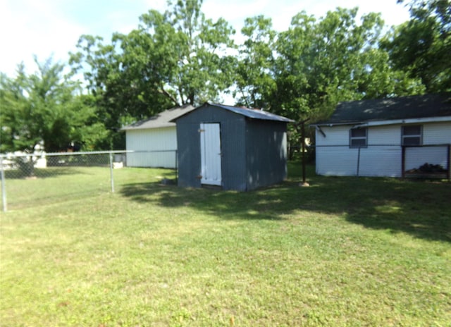 413 Paulus St, Schulenburg, TX 78956 - view of yard featuring a shed and an outbuilding