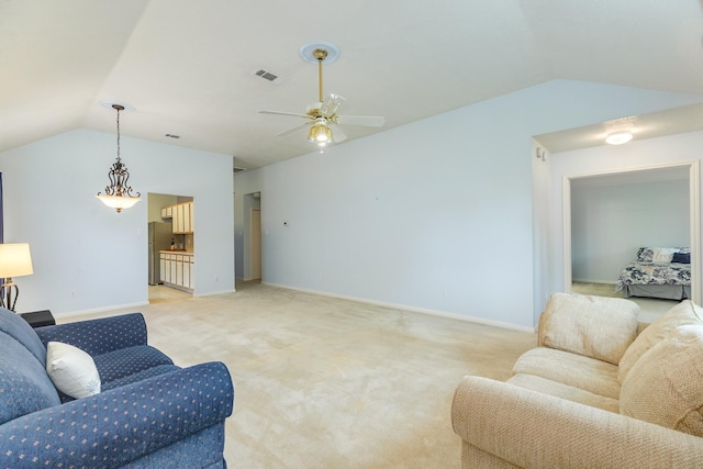 606 Redwood Bend Ln, Pearland, TX 77584 - living room featuring lofted ceiling, ceiling fan, light colored carpet, and baseboards