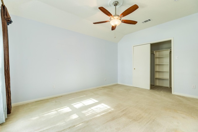 606 Redwood Bend Ln, Pearland, TX 77584 - unfurnished bedroom featuring light colored carpet, baseboards, vaulted ceiling, a closet, and a ceiling fan