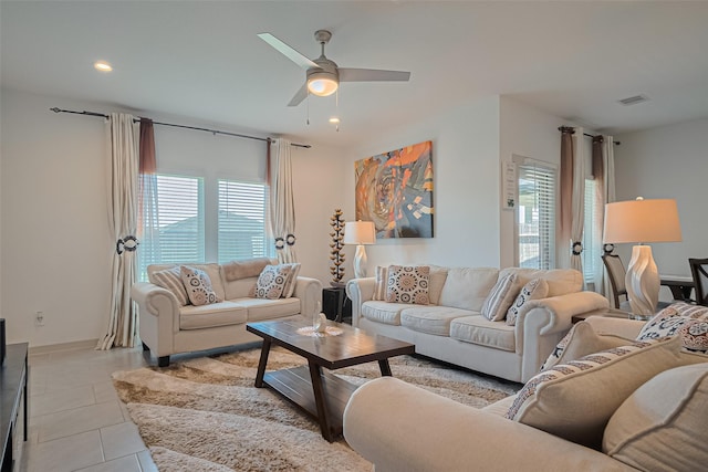 28923 Yukon River Ct, Katy, TX 77494 - living room with plenty of natural light, ceiling fan, light tile patterned floors, and recessed lighting