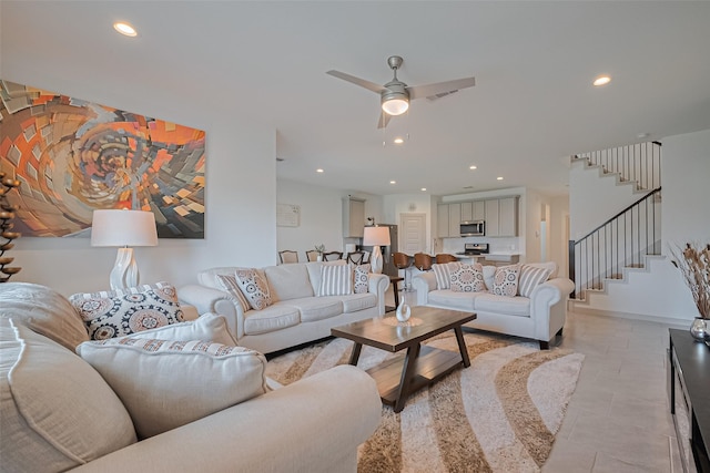 28923 Yukon River Ct, Katy, TX 77494 - living area with recessed lighting, stairs, a ceiling fan, and light tile patterned flooring