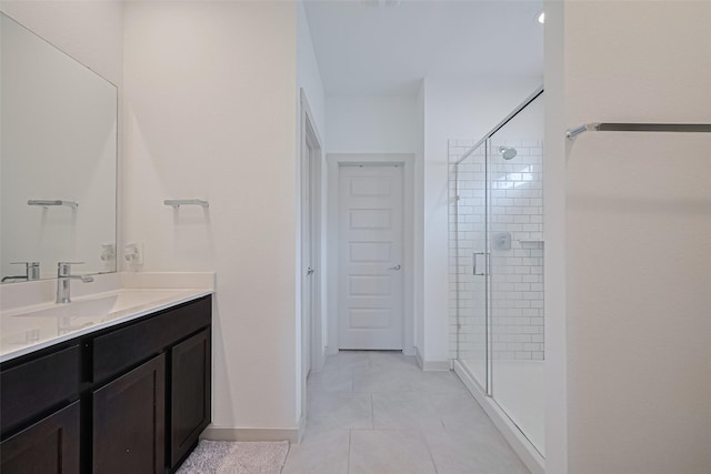 28923 Yukon River Ct, Katy, TX 77494 - full bath featuring a shower stall, vanity, tile patterned flooring, and baseboards