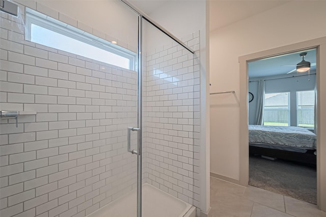 28923 Yukon River Ct, Katy, TX 77494 - full bathroom featuring ensuite bathroom, a stall shower, tile patterned flooring, and a ceiling fan