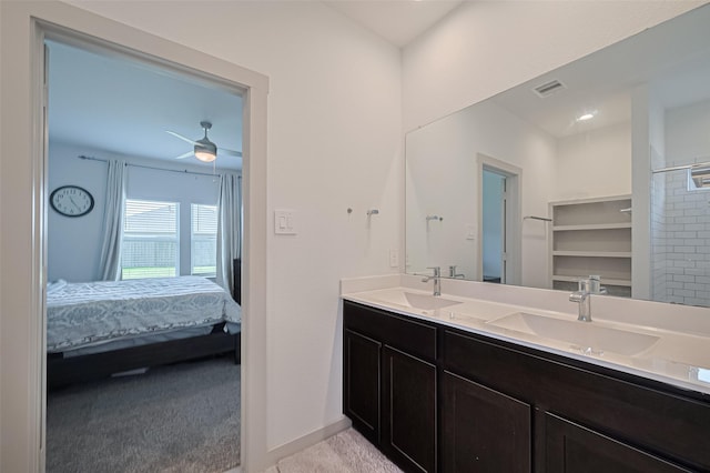 28923 Yukon River Ct, Katy, TX 77494 - ensuite bathroom with double vanity, baseboards, ceiling fan, and a shower